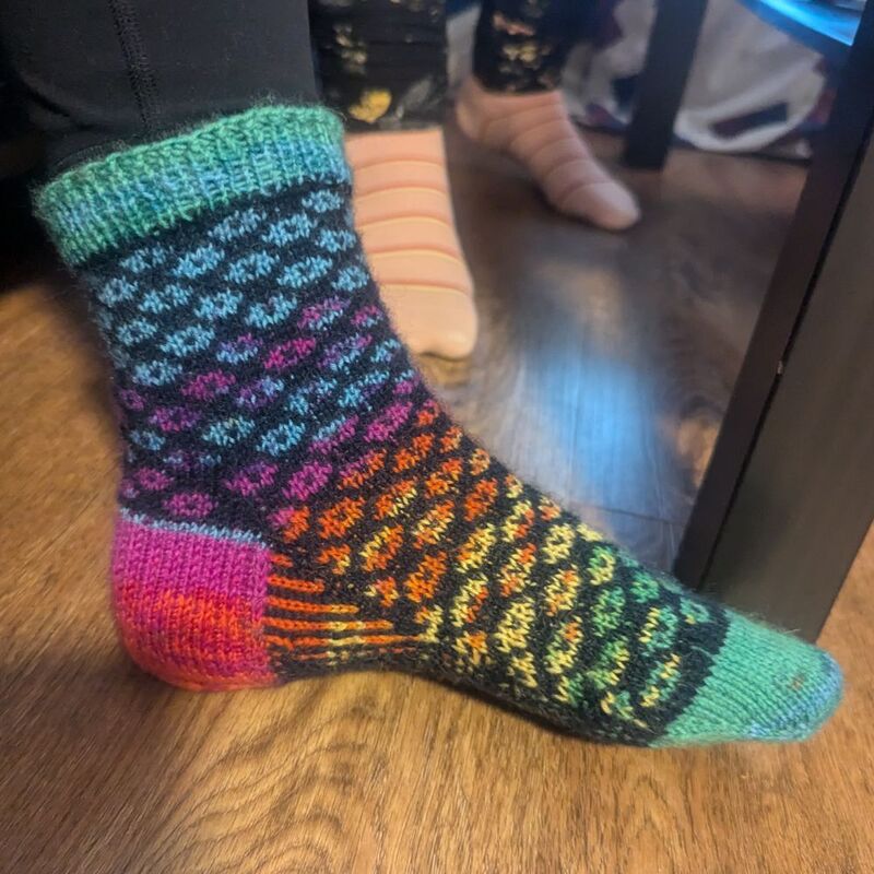 One of three pairs of knitted socks I made for the 2024 tour.